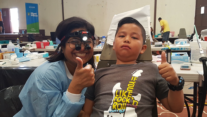 Dr. Kurian and young male patient doing thumbs up