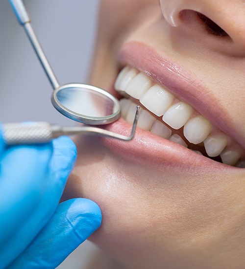 woman getting gum disease treatment