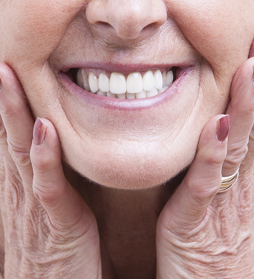 woman framing smile